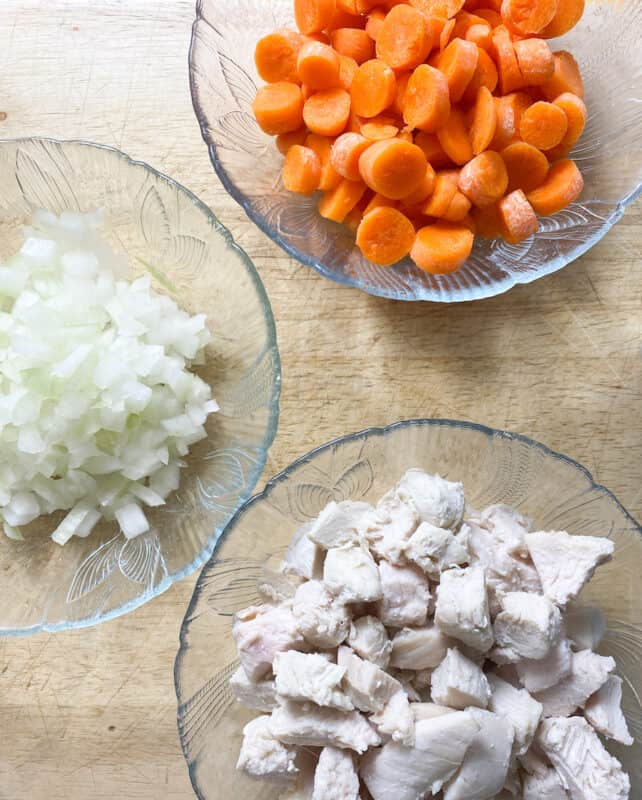 carrots, onions and diced chicken ready for chicken pot pie filling