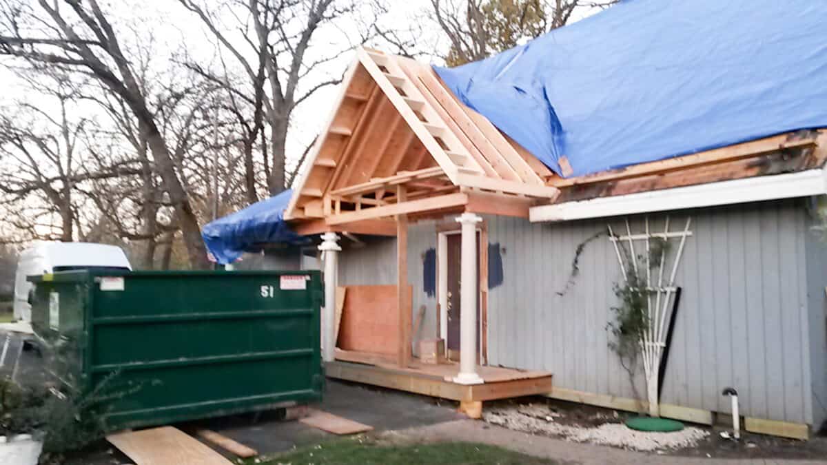 new porch an roof framed out and decking put on right before the roof got re-shingled