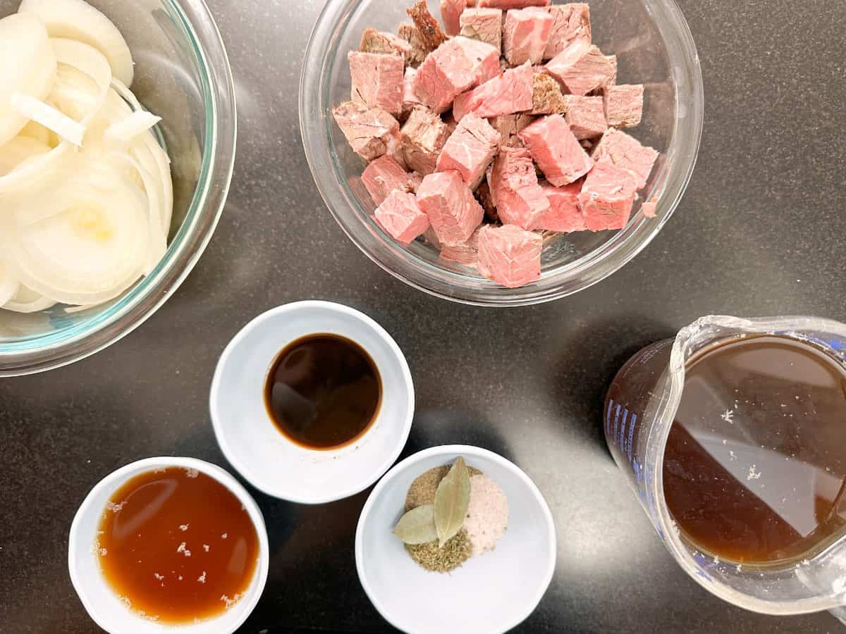 all the ingredient for the beef sirloin tips with onion gravy