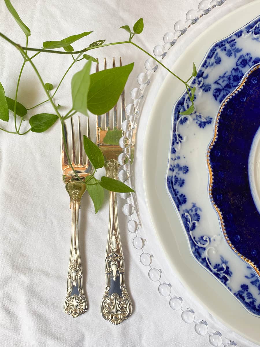 a place setting of flow blue plates that I collect