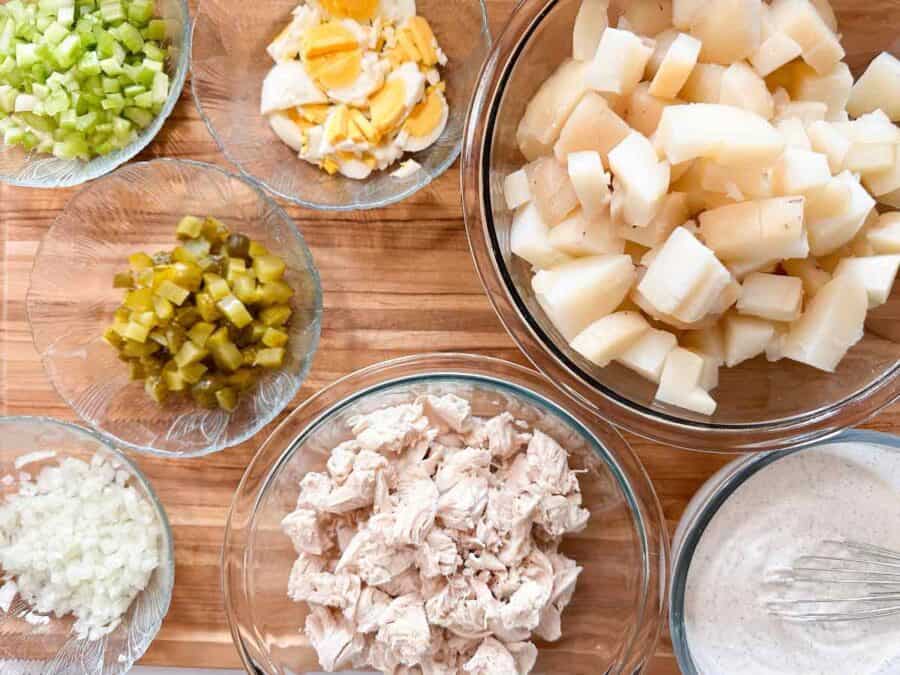 all the ingredients for potato chicken dill pickle salad