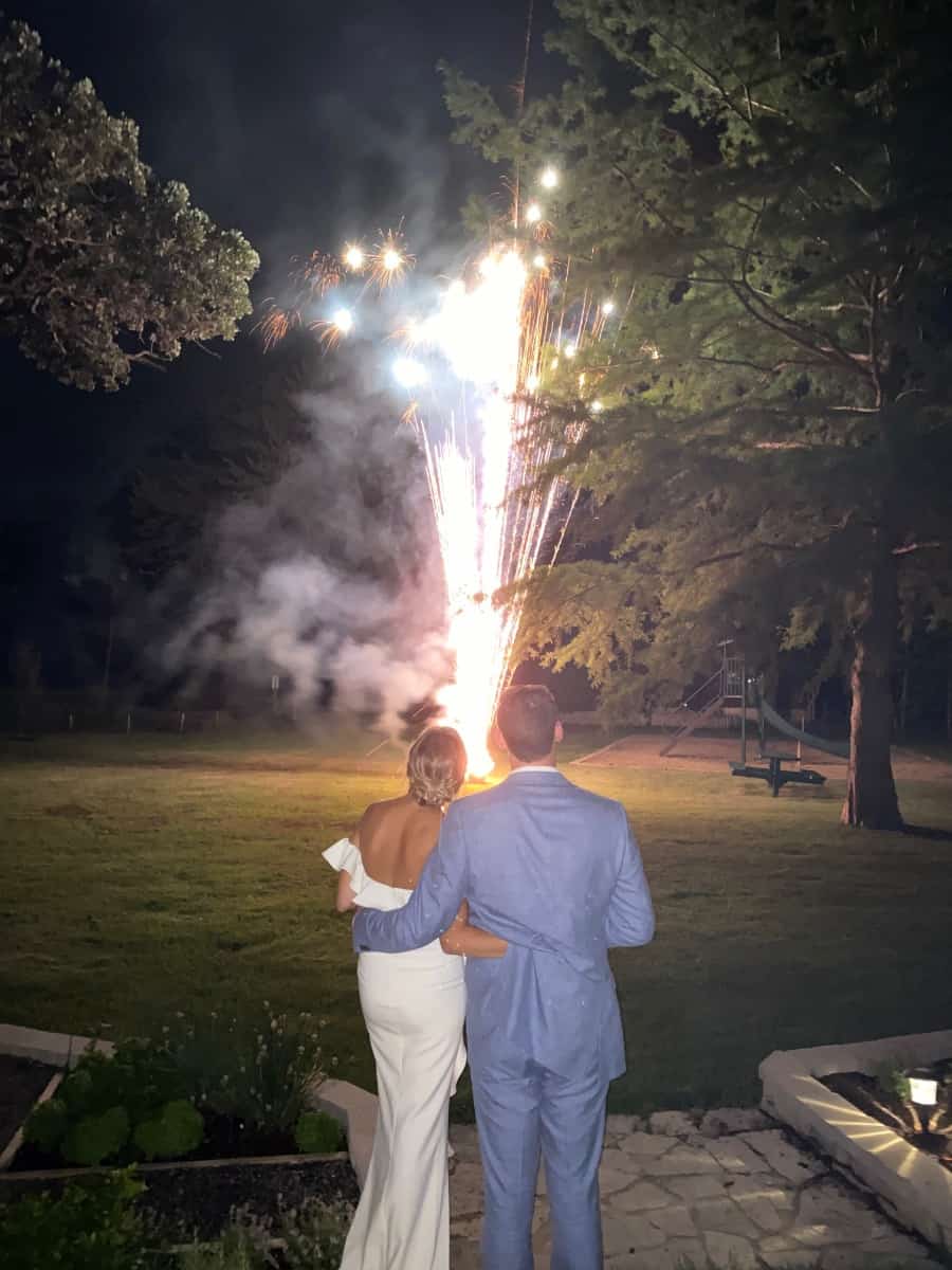 fireworks at the end of a beautiful intimate vintage backyard wedding
