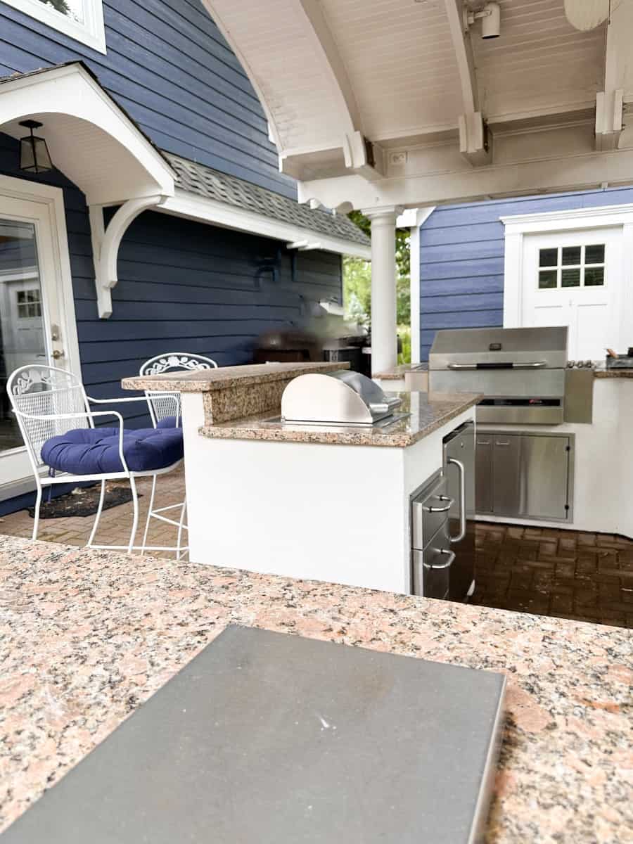 photo of our outdoor kitchen facing the indoor kitchen door in our outdoor living space