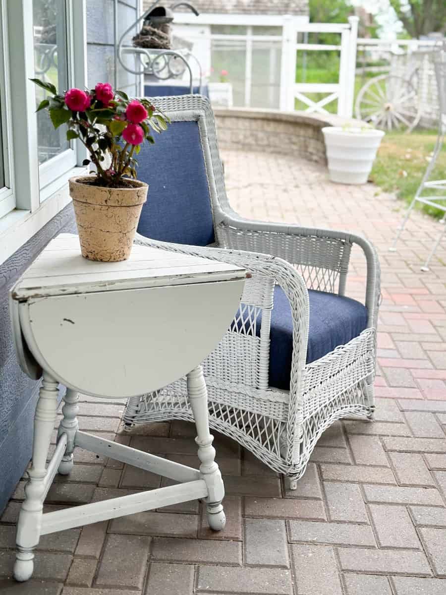 vintage wicker chair and table repurposed for outdoor living space