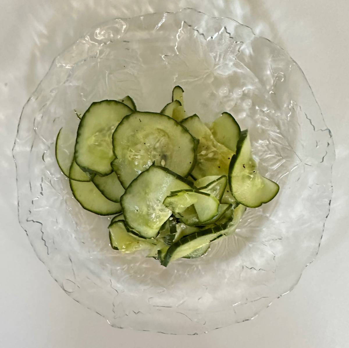 cucumber salad on a glass plate