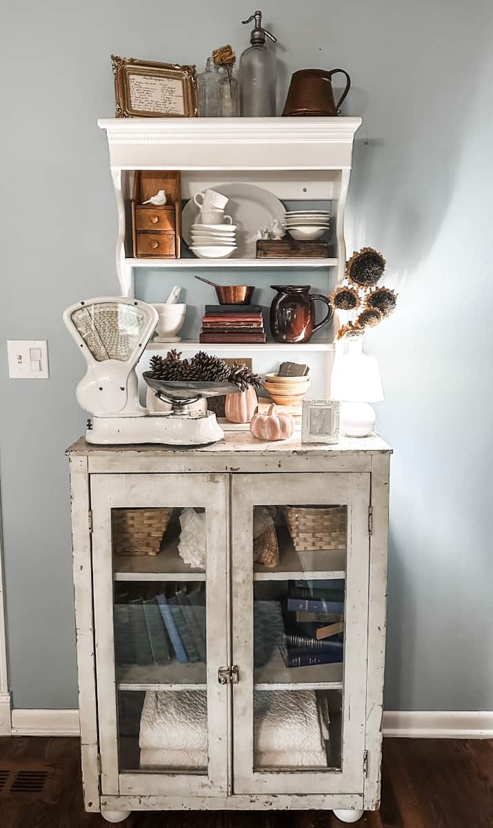 the topper on my entryway cabinet that houses some of my vintage fall decor