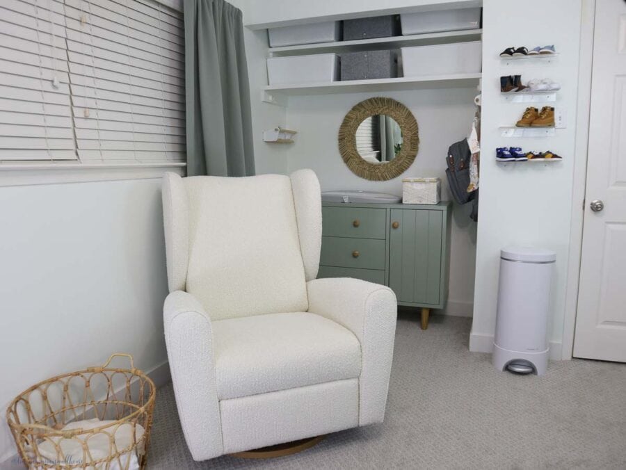 a photo of the converted baby nursery closet with a rocking chair in front of it. 