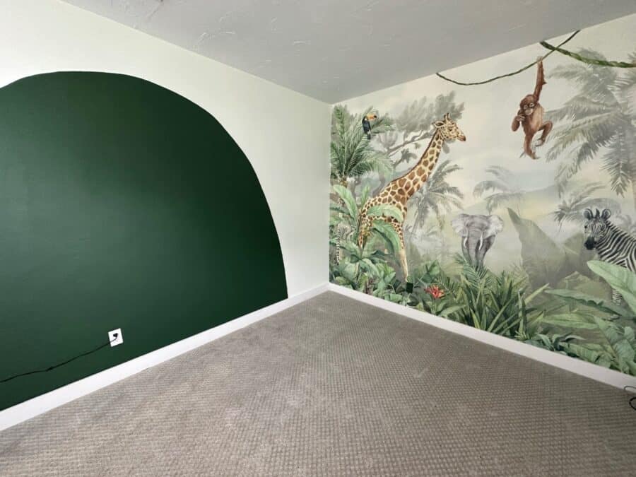 Baby Nellen Nursery Walls with Jungle Mural and painted arch