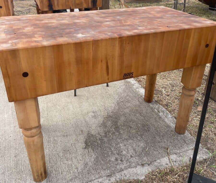 Large butcher block table at round top