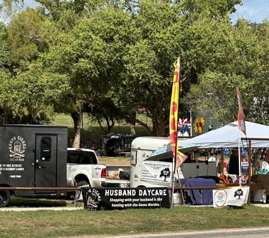 a spot called "Husband Daycare" in Round Top. Food Truck type set-up with a cigar truck, BBQ, Beer and Football.