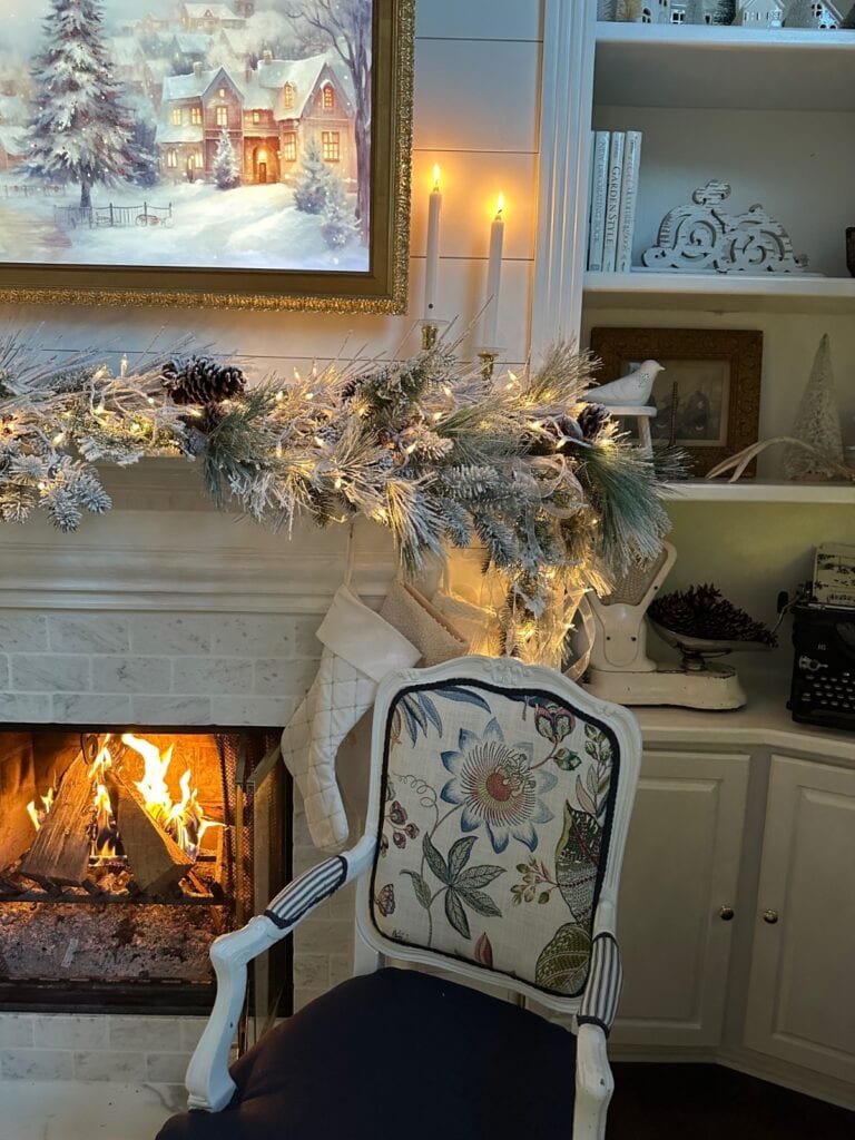 A cozy fireplace with a chair and a festive garland—perfect inspiration for your Saturday Shopping finds.