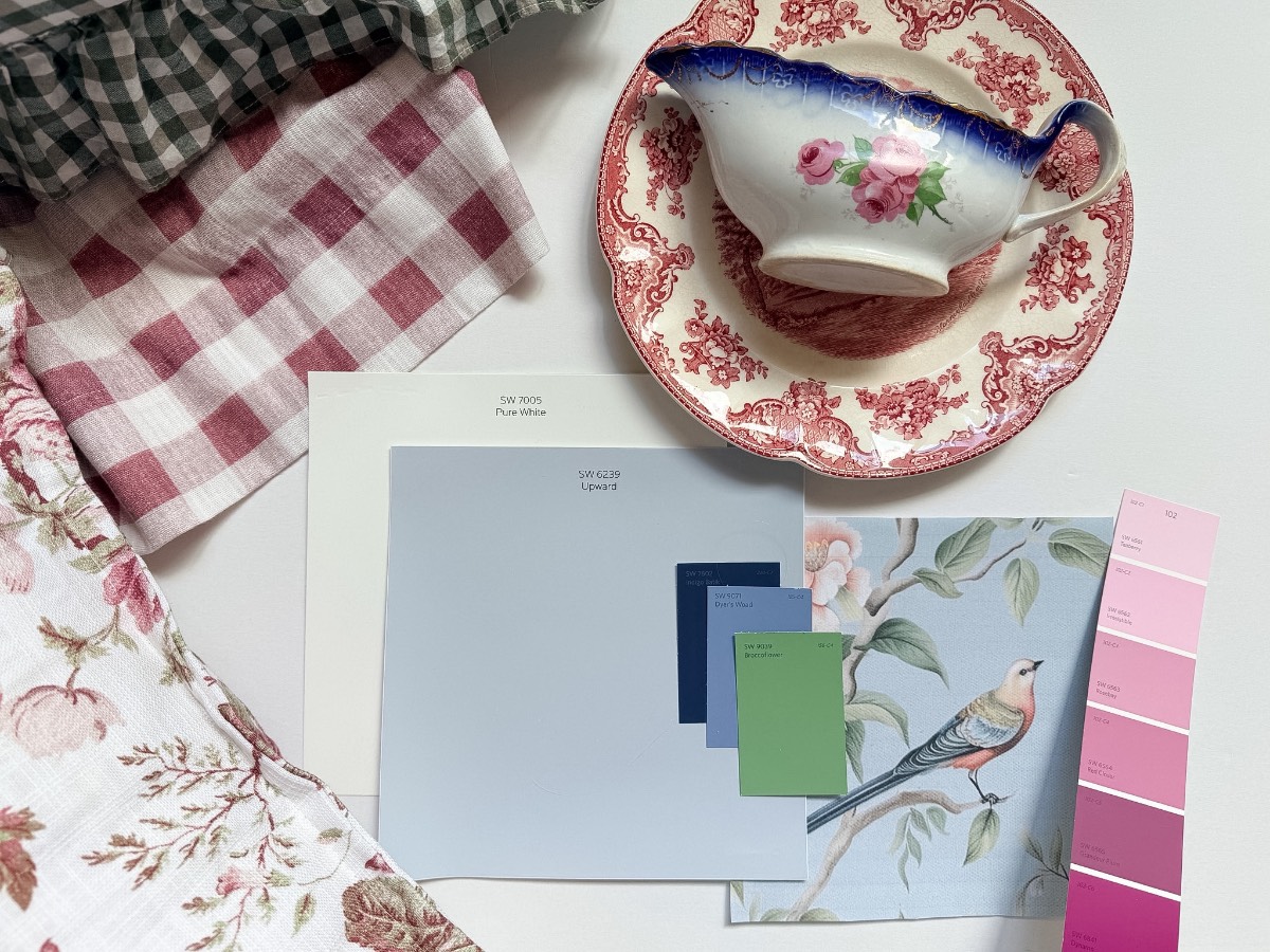 Assorted fabrics, paint swatches, a floral dish, and a bird print inspire how to refresh your home for summer.
