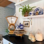 Vintage kitchen scale, blue teapot, and jars—decide what things to throw away right now for a clutter-free space.
