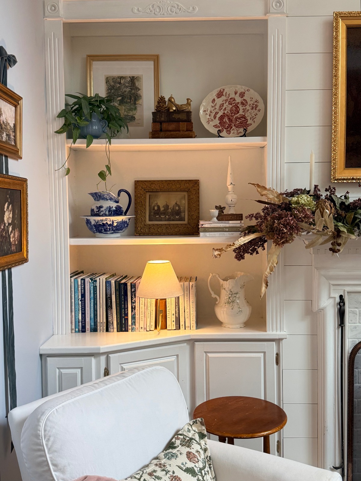 Built-in bookshelves spaced to three shelves with room for leaning art