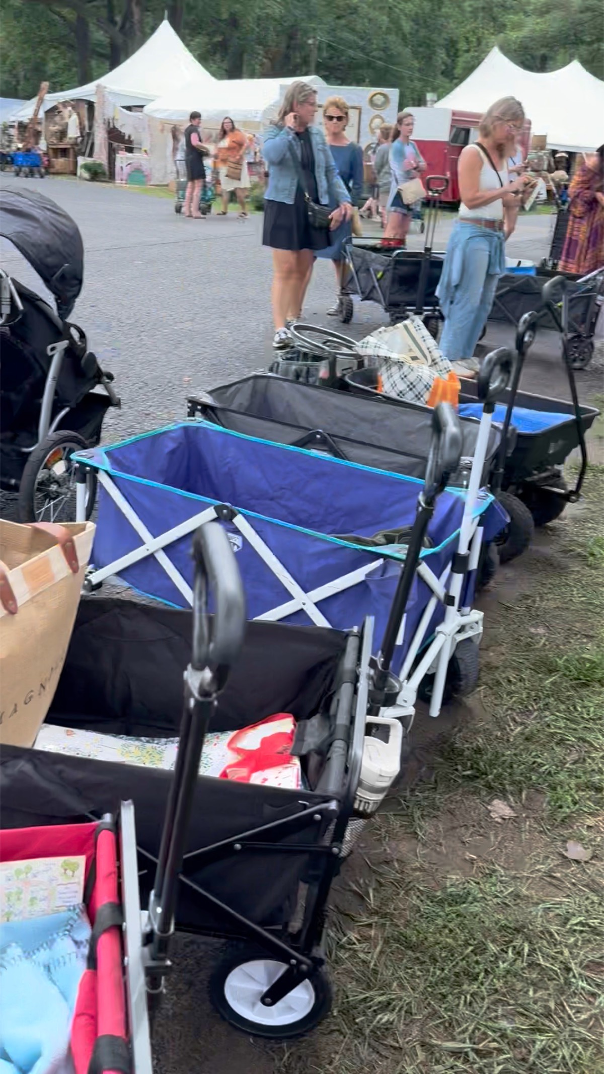 Wagons ready to load with vintage finds at an outdoor antique market. A must have for an outdoor vintage market.