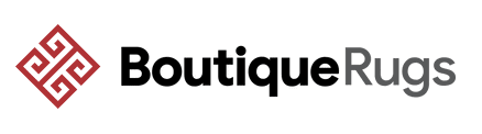Boutique Rugs logo featuring a red geometric knot icon next to the company name, showcasing the latest branding.